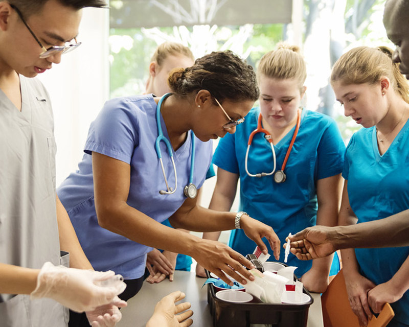 group of new to profession nurses learning